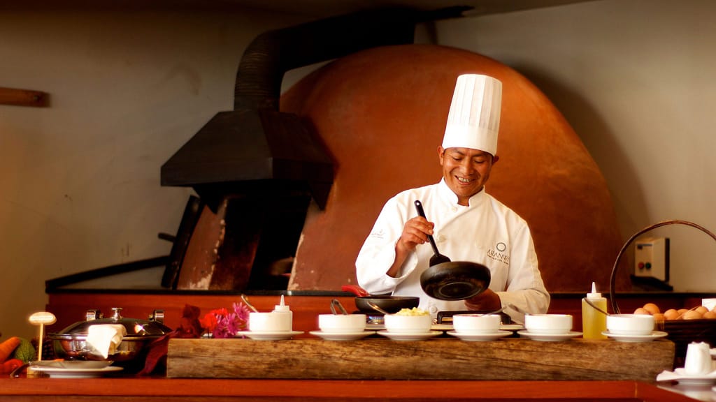 Luxury hotels in Sacred Valley - Chef preparing food at Aranwa Sacred Valley hotel. 