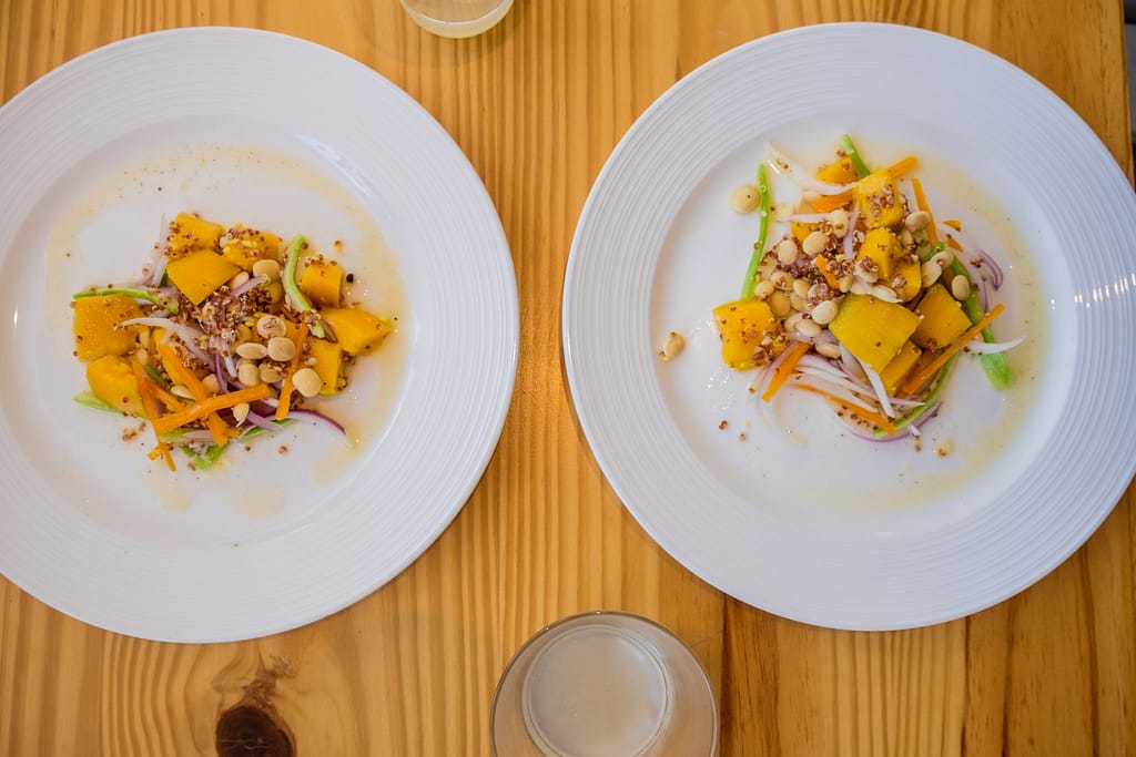 Cooking class in Cusco - Colourful plates of mango ceviche.